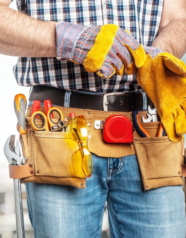 detail of handyman wearing protection gloves